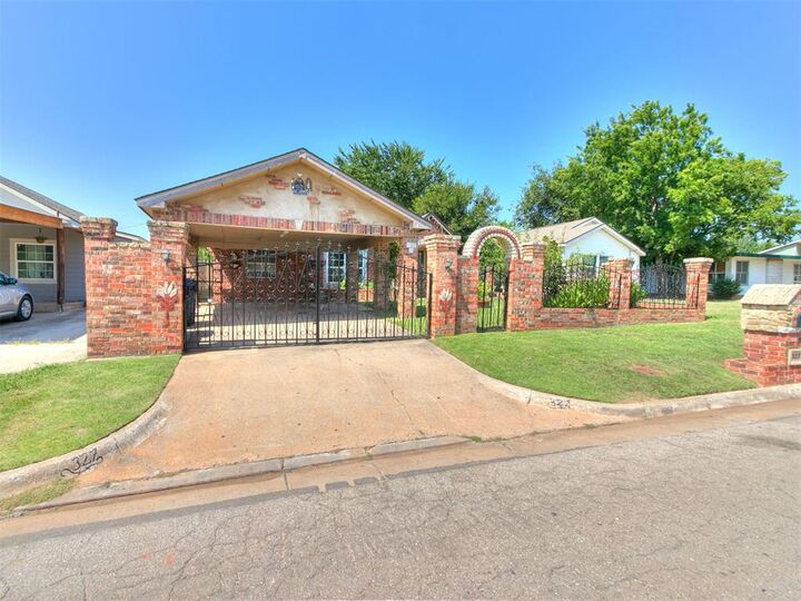 Property Photo:  327 SE 46th Street  OK 73129 