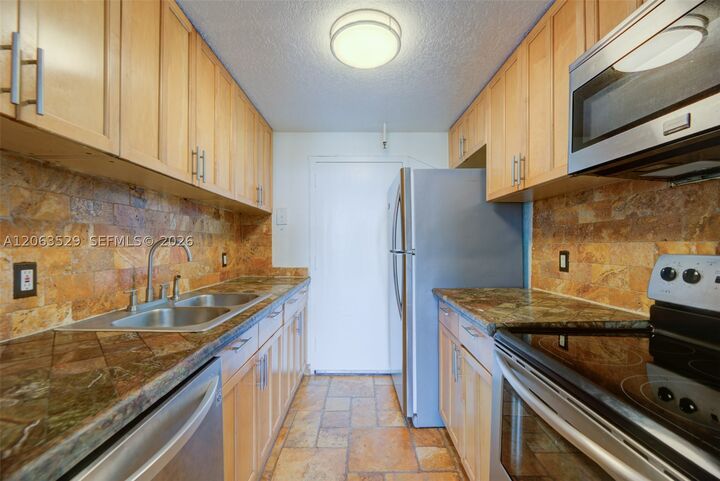 Property Photo:  2350 NE 135th St 1503  FL 33181 