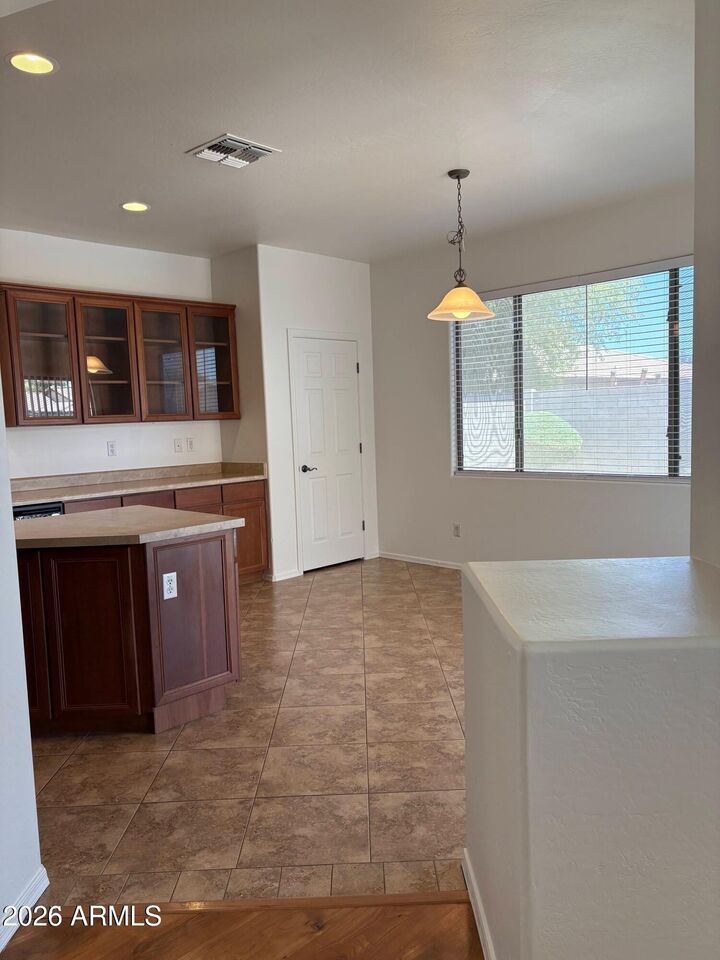 Property Photo: 8783 W State Avenue AZ 85305