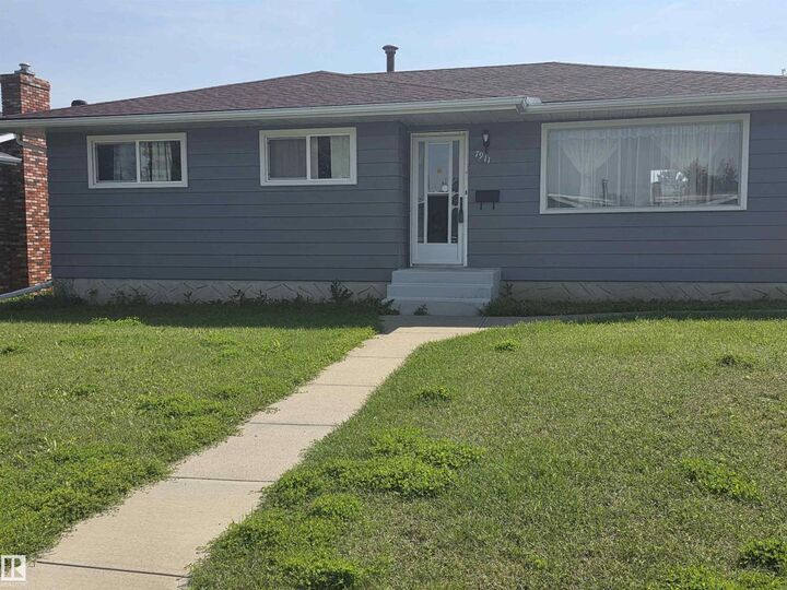 Property Photo:  7911 145 Av NW NW  AB T5C 2S8 