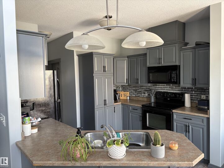 Property Photo:  4900 62 Street 18  AB T4X 0C6 