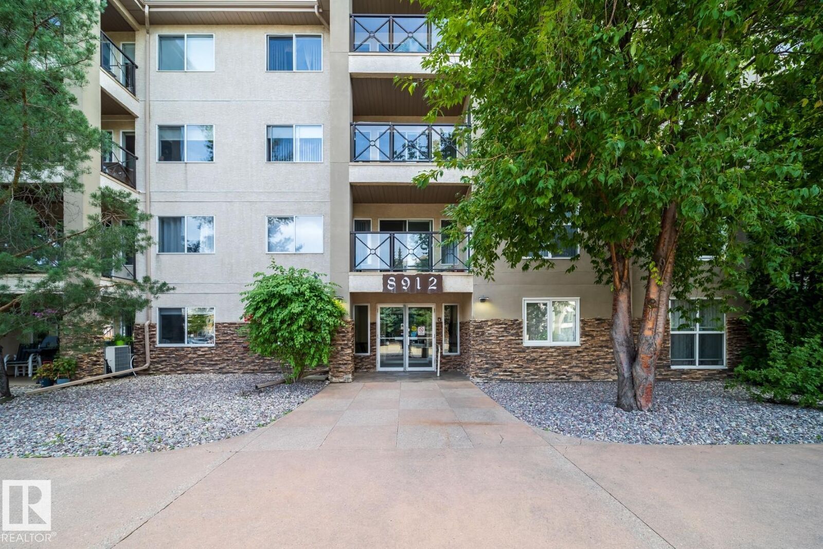 Property Photo:  8912 156 Street NW 209  AB T5R 5Z2 