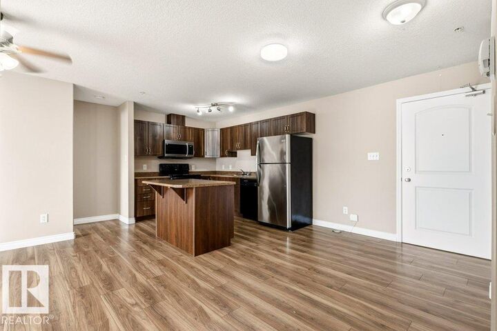 50 Woodsmere Close 336 — photo 1