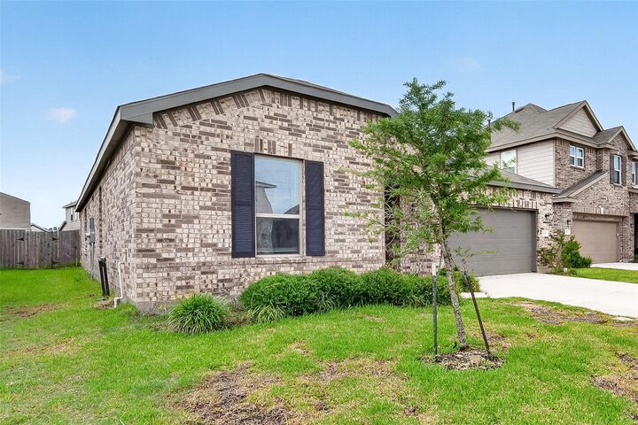 Property Photo: 25611 Reign Wayman Court TX 77493