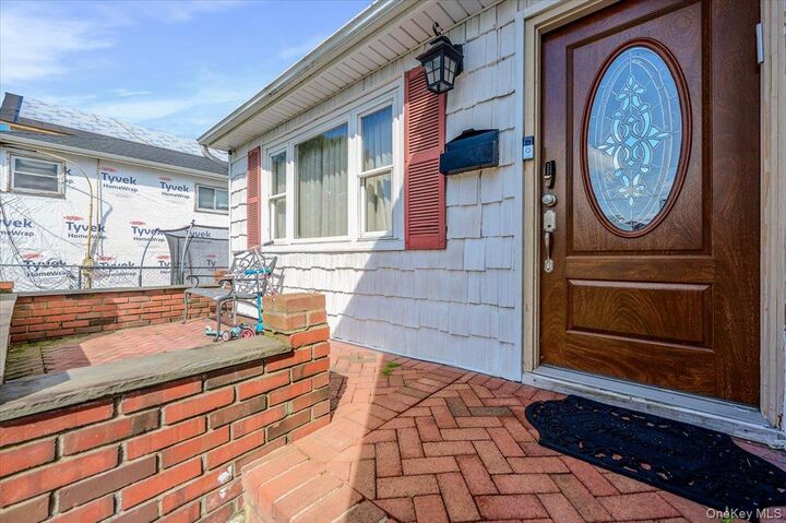 Property Photo: 30 Cheshire Road NY 11096