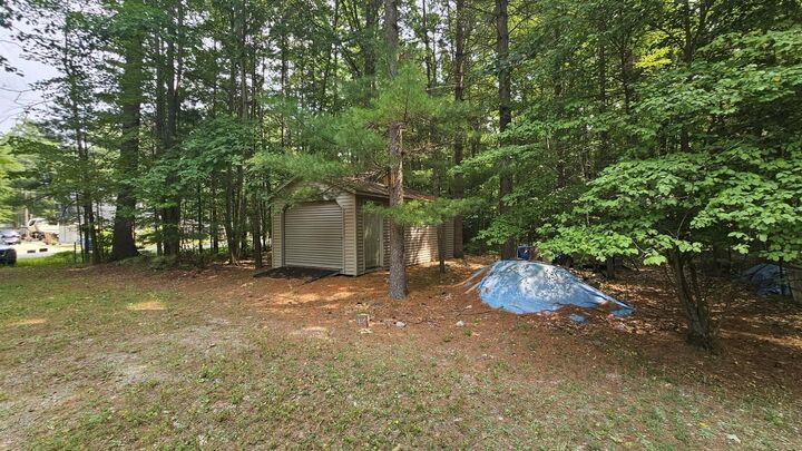 Property Photo:  98 West River Drive  MI 48624 