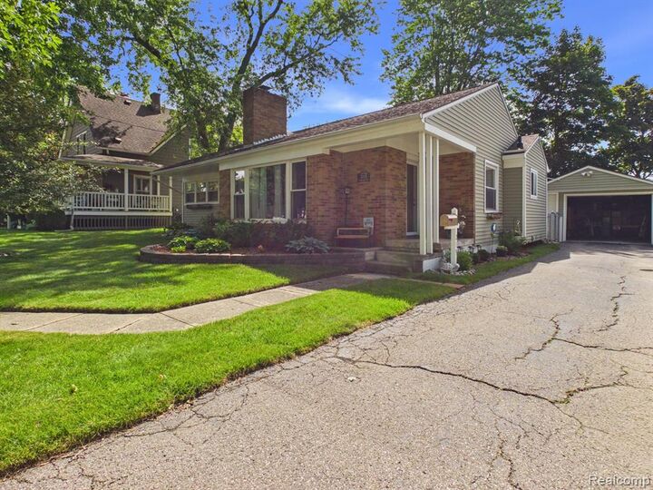 Property Photo:  213 Sawyer Street  MI 48439 1344 