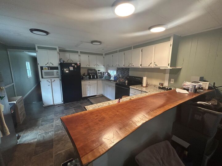 Property Photo:  10 Rudman Drive  NH 03839 