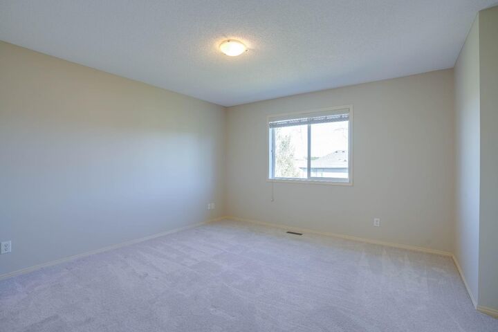 Property Photo:  15 Tuscany Reserve Bay NW  AB T3L 0A9 
