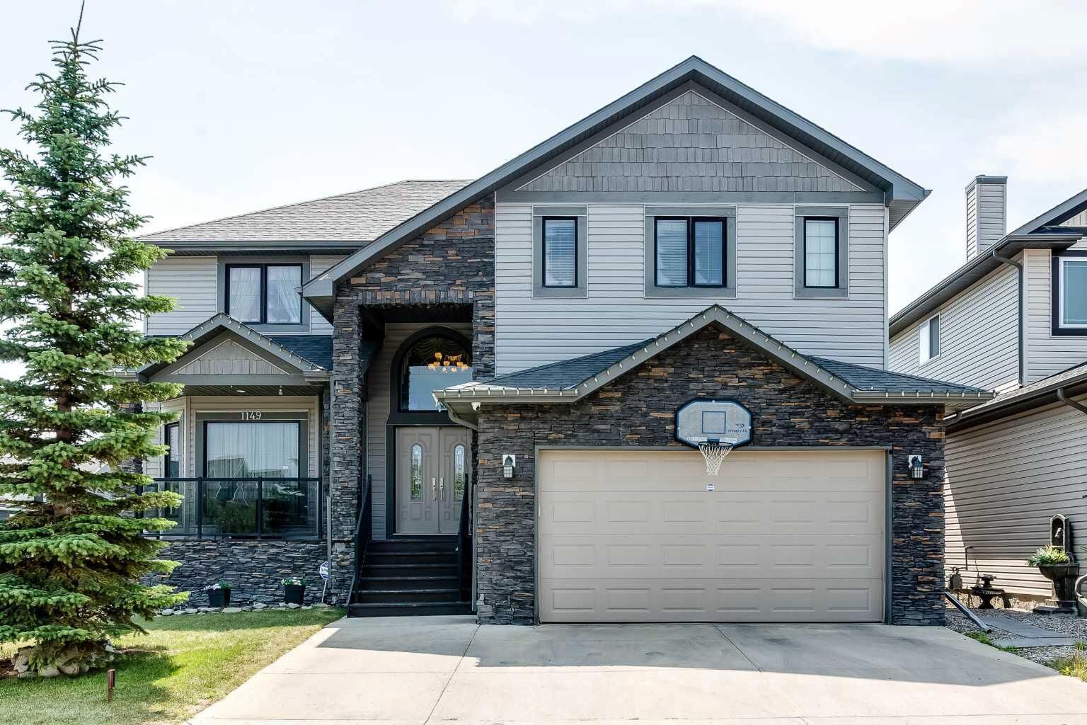 Property Photo: 1149 Channelside Drive SW AB T4B 3J4