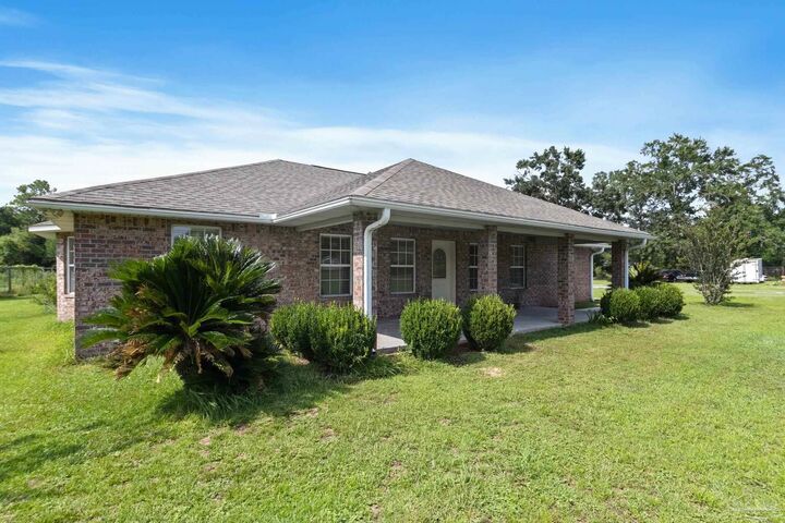 Property Photo:  11560 Mobile Hwy  FL 32526 