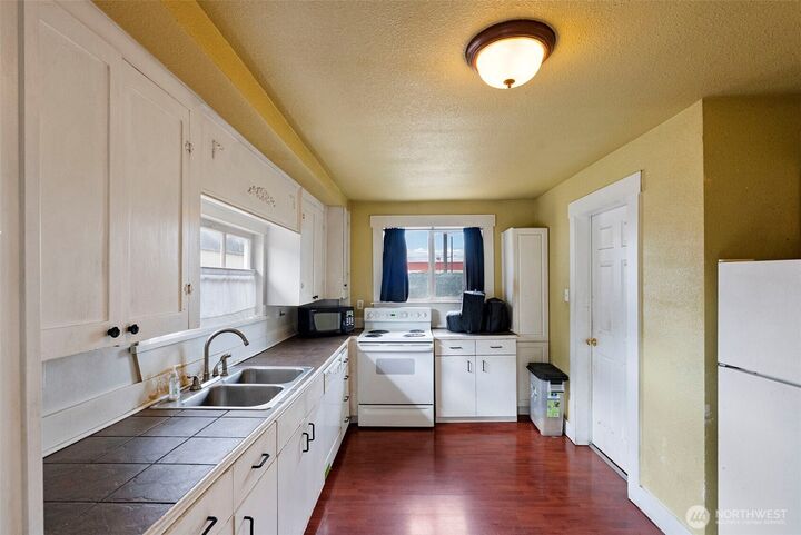 Property Photo: 6614 S Puget Sound Avenue WA 98409