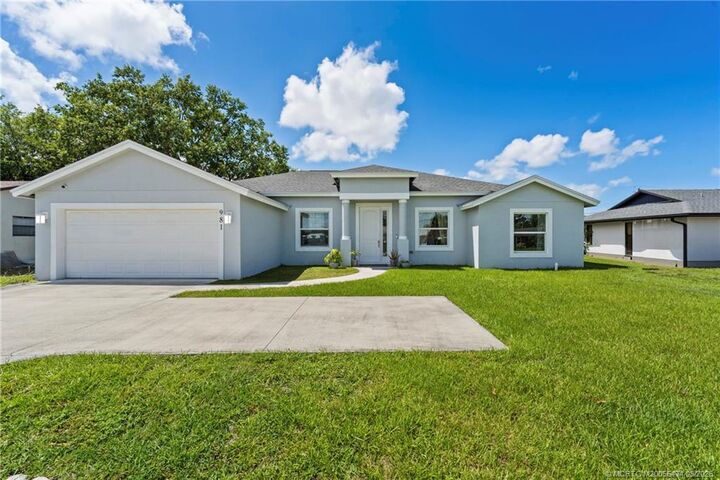 Property Photo: 981 SW California Boulevard FL 34953
