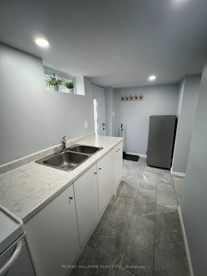 Property Photo:  102 Barton Avenue #Basement  ON M6G 1P6 