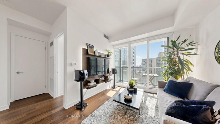 Property Photo: 115 Blue Jays Way 3906 ON M5V 0N4