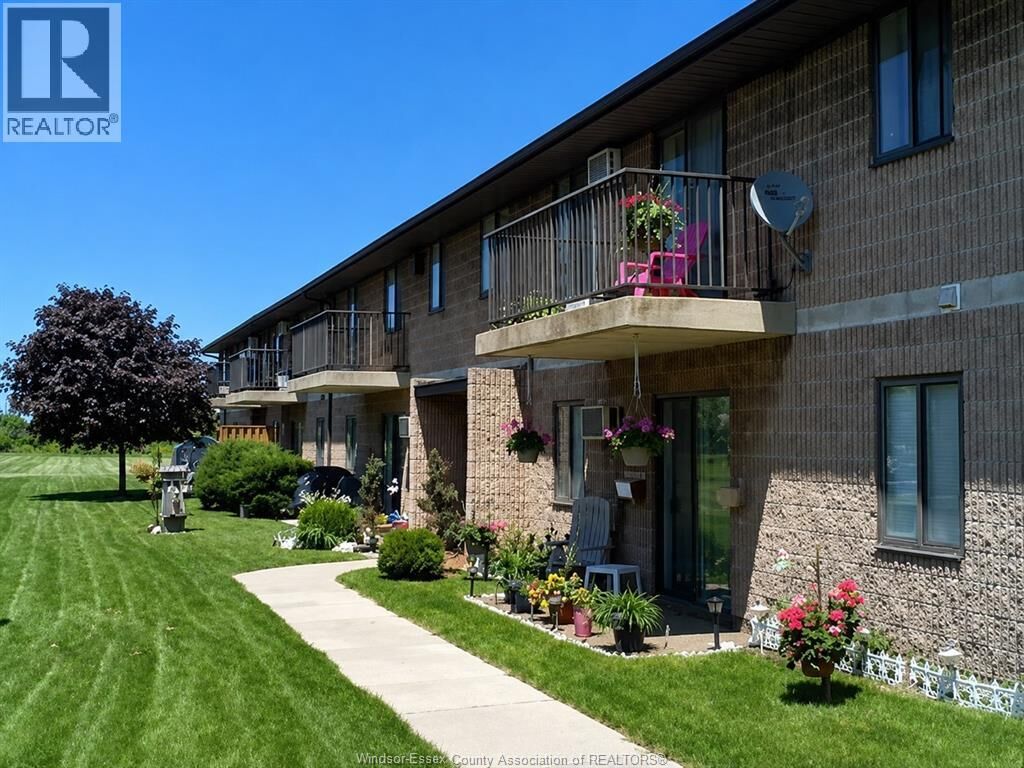 Property Photo:  11822 Tecumseh Road East 105  ON N8N 1L7 
