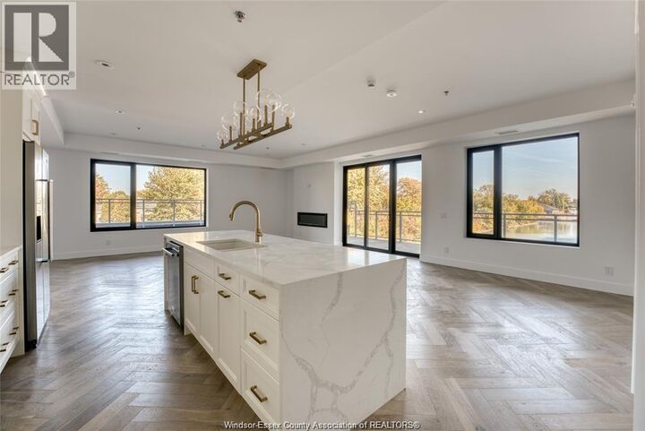 Property Photo:  14400 Tecumseh Road East 203  ON N8N 0E9 