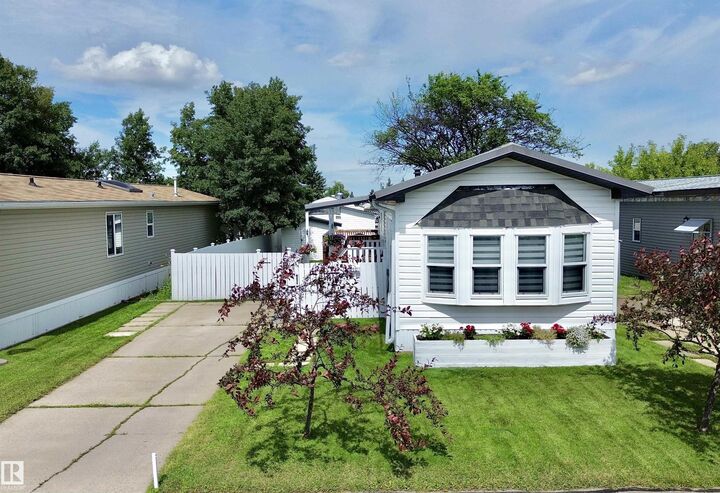 Property Photo:  1410 Jubilee Drive  AB T8H 1L7 