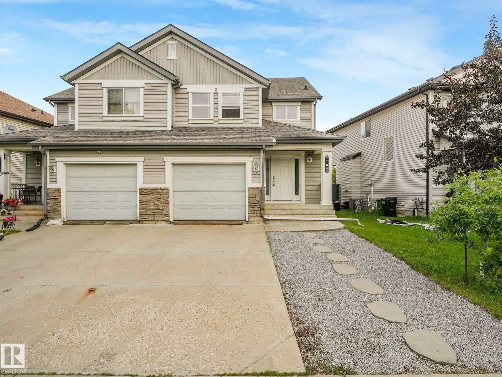 Property Photo:  11844 21 Avenue SW  AB T6W 0C9 