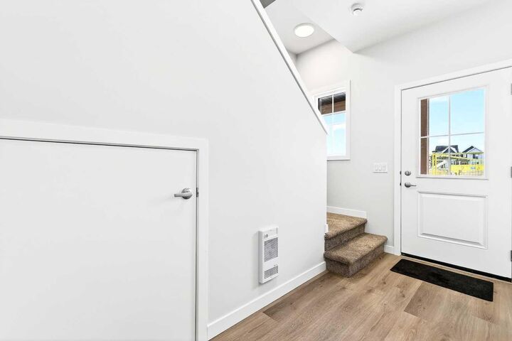 Property Photo: 40 Creekside Way SW 302 AB T2X 6E2