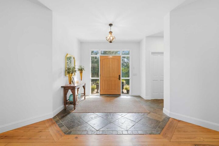 Property Photo:  31250 Woodland Way  AB T3R 1G5 