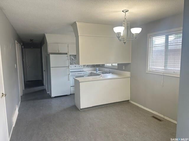 Property Photo:  724 Eastview Avenue  SK S4N 0A2 