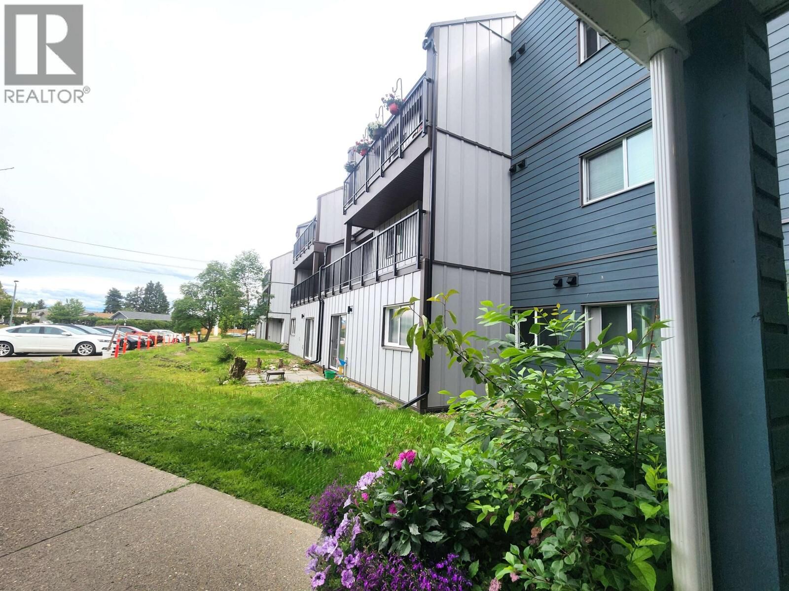 Property Photo: 3033 Ospika Boulevard 202 BC V2N 4L5