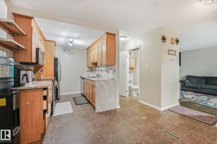 Property Photo: 203B Homestead Crescent NW AB T5A 2Y2