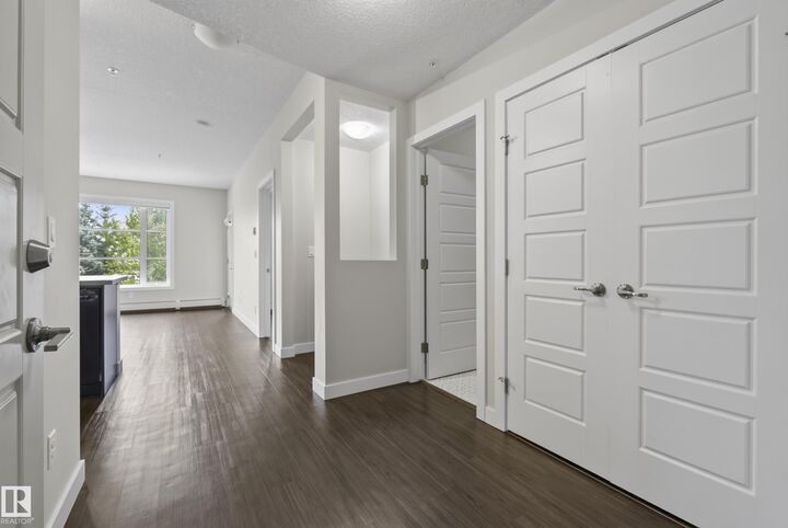 Property Photo: 2588 Anderson Way SW 206 AB T6W 0R2