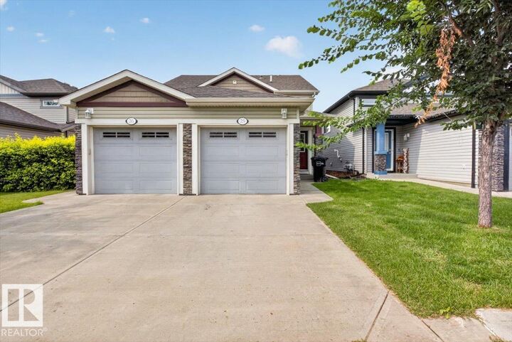 Property Photo: 6520 2 Avenue SW 25 AB T6X 1S4