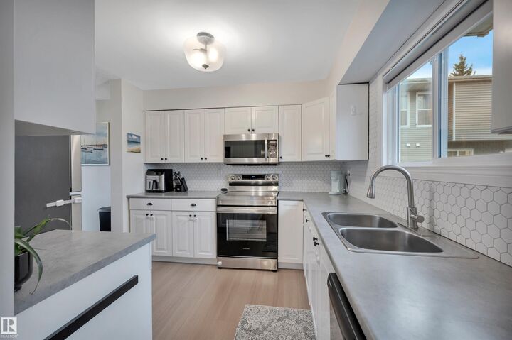 Property Photo: 4403 Riverbend Road NW AB T6H 5S9