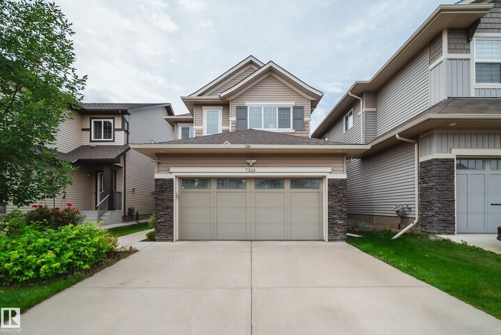 Property Photo: 7314 Edgemont Way NW AB T6M 0S1