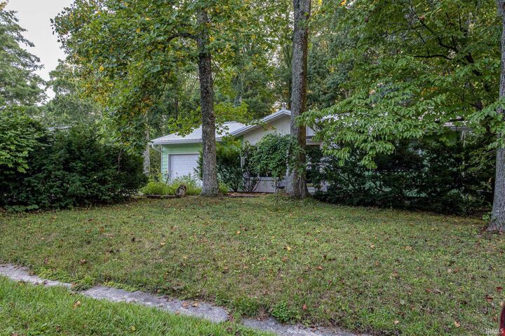 Property Photo:  4665 N Happy Hollow Road  IN 47408 