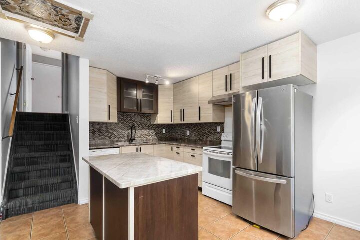 Property Photo: 156 Rock Bay AB T9K 1B2