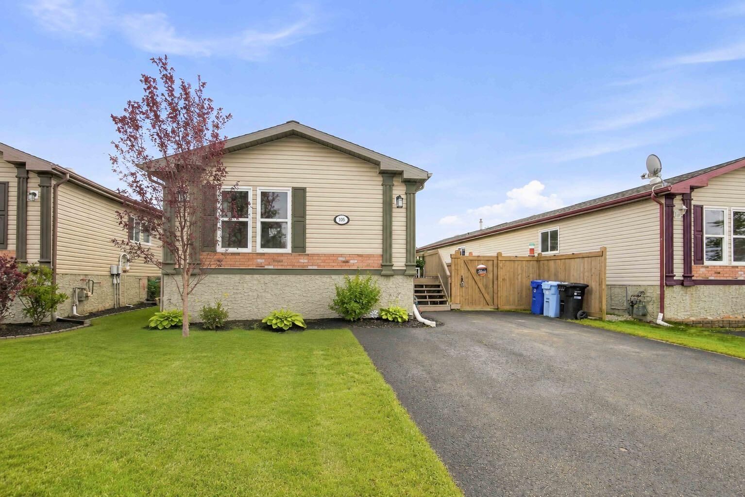 Property Photo: 105 Sumac Crescent AB T9K 0H8