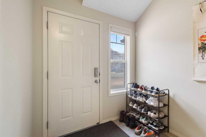 Property Photo: 17 Panatella Villas NW AB T3K 0G7