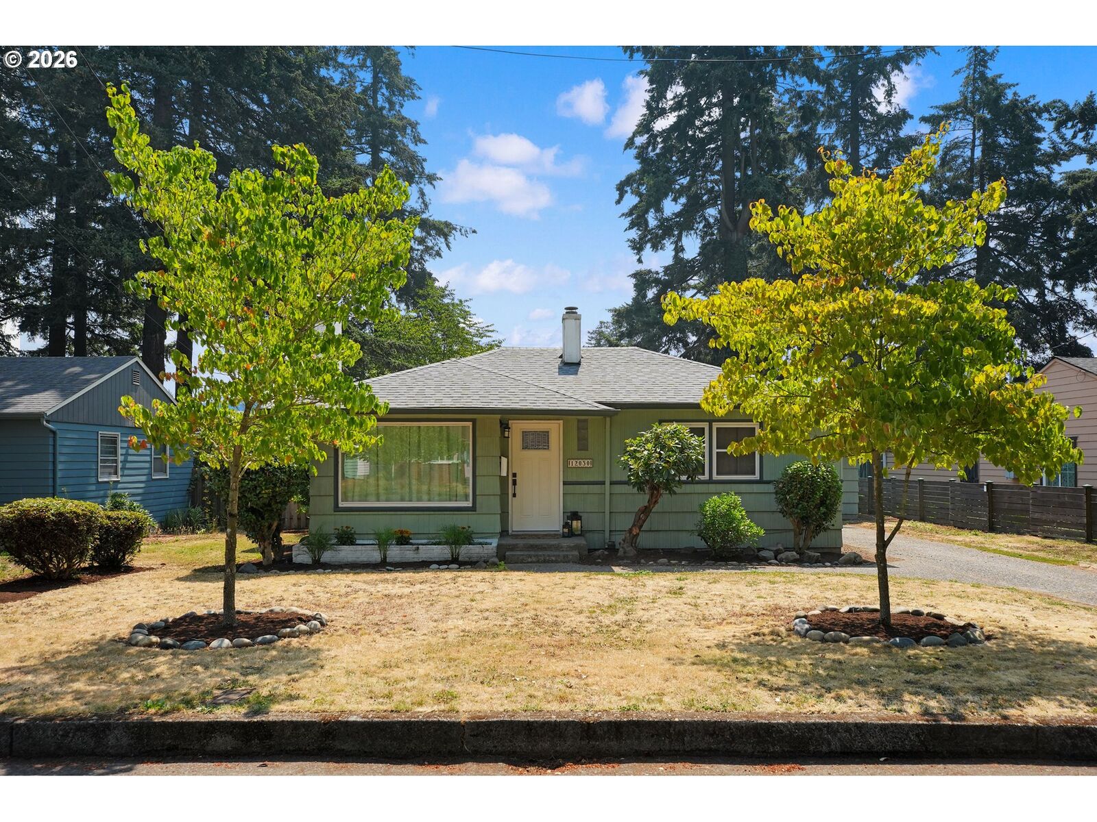 Property Photo:  12050 NE Broadway  OR 97220 