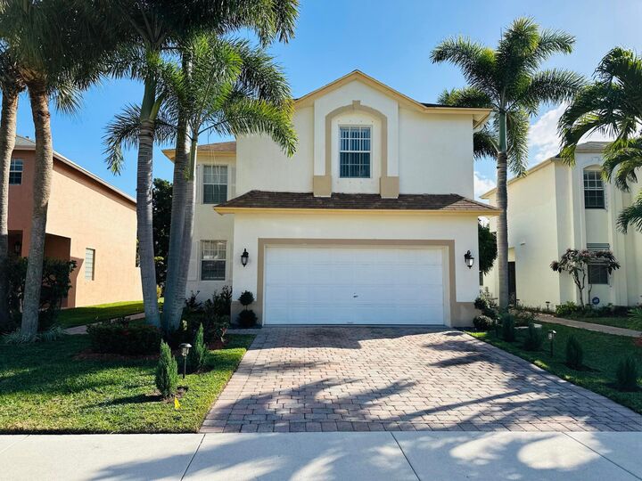 Property Photo: 5780 Azalea Circle FL 33415