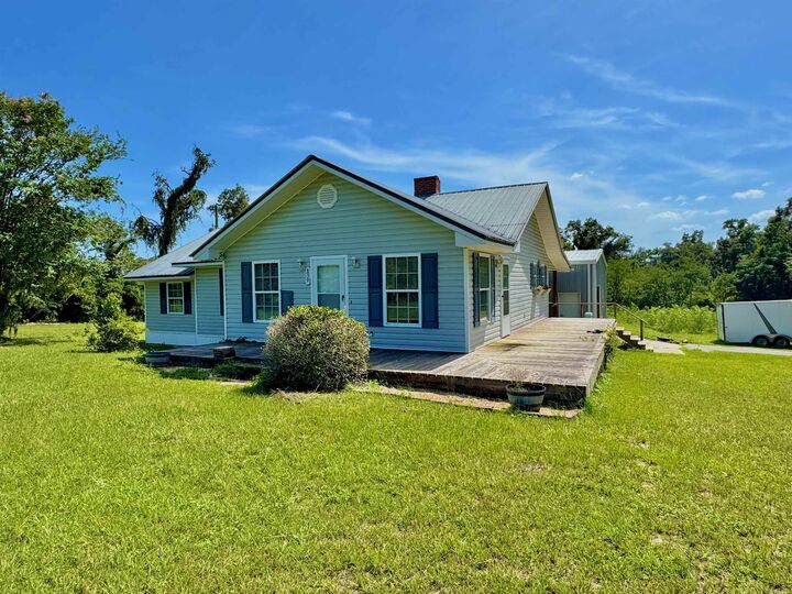 Property Photo:  839 NE Post Road  FL 32340 