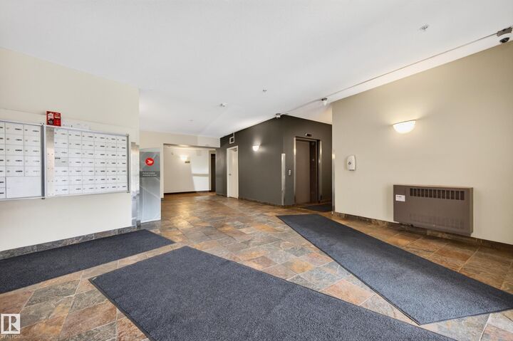 Property Photo: 4316 139 Avenue NW 211 AB T5Y 0L1