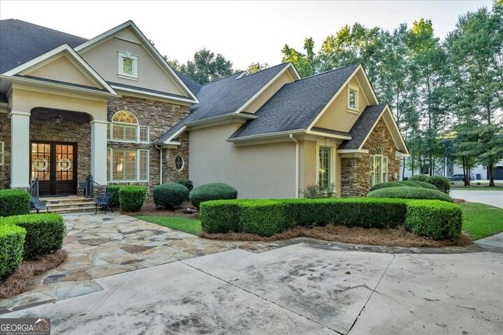 Property Photo:  205 Walton Chase  GA 31069 