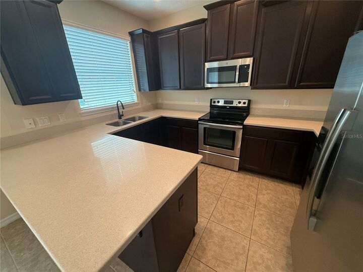 Property Photo:  9460 Strongbark Lane  FL 32832 