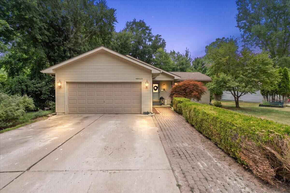 Property Photo: 48521 9 Mile Road MI 48167-9707