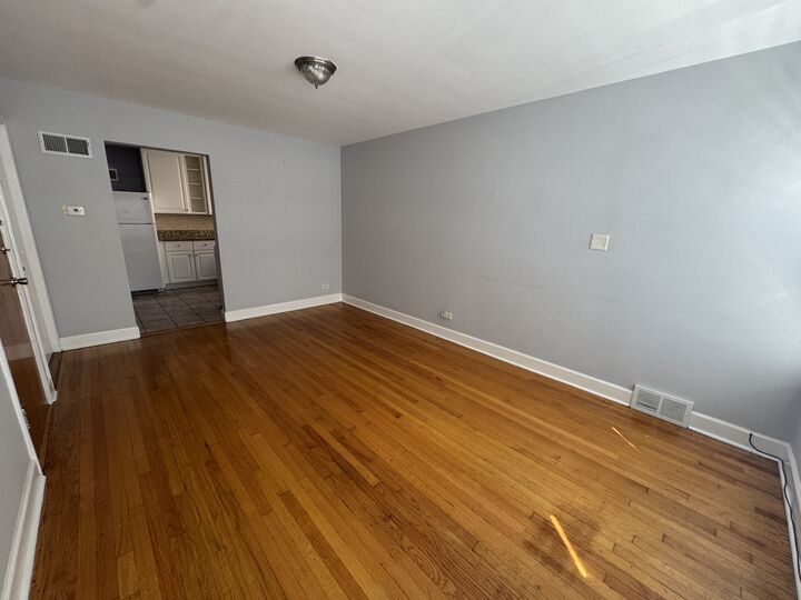 Property Photo:  9034 La Crosse Avenue 1S  IL 60077 