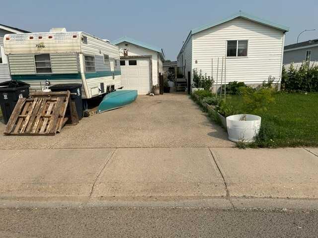 Property Photo: 8 Meadowlake Gate E AB T1R 1E9