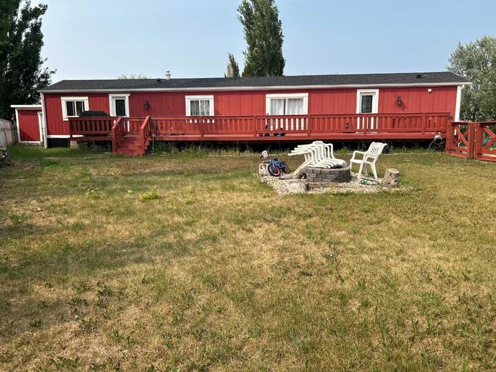 Property Photo: 116 Meadow Lake Close E AB T1R 1G1