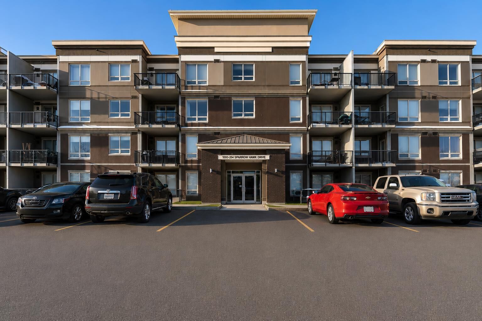 Property Photo:  204 Sparrow Hawk Drive NW 1404  AB T9K 0P1 