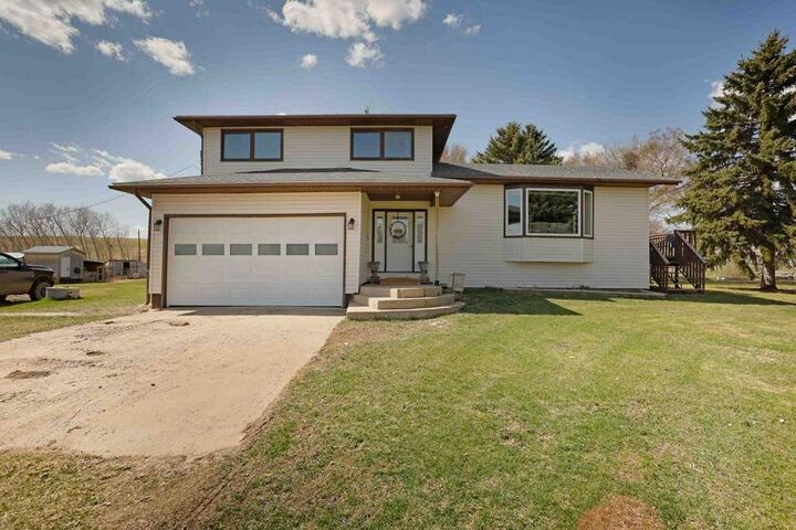 Property Photo: #26 142041 Tr 200 AB T1R 1B9