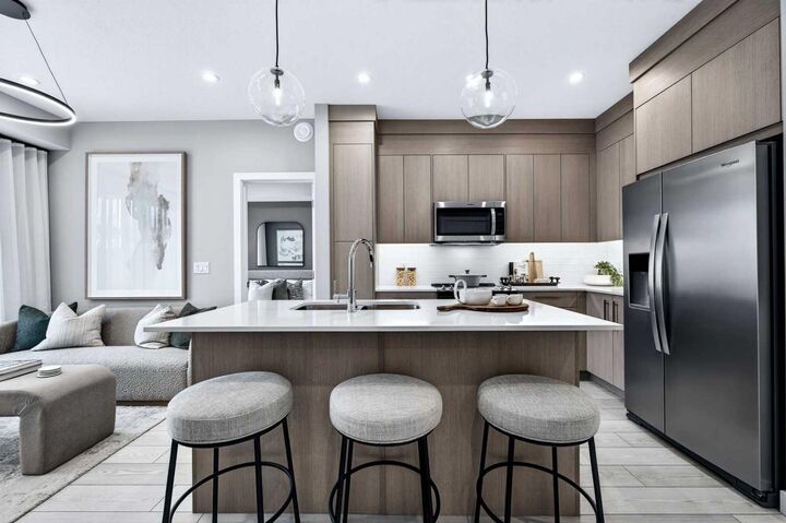 Property Photo: 265 Wolf Willow Boulevard SE 2304 AB T2X 6P9