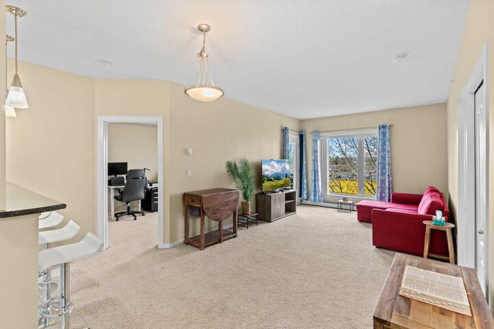 Property Photo: 604 East Lake Boulevard NE 1404 AB T4A 0G6
